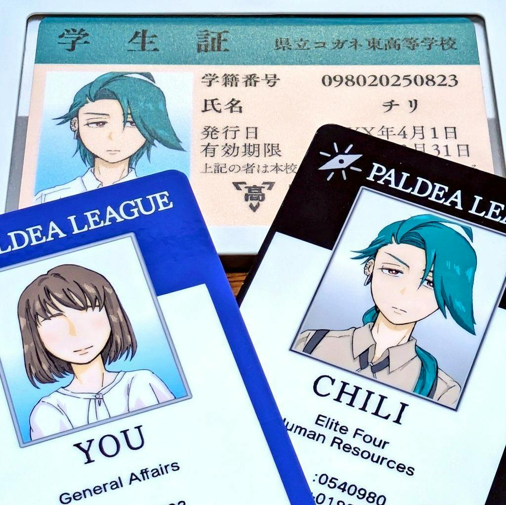 Close-up of ID-style stickers for student/employee cards showing illustrated portraits labeled "YOU" and "CHILI".