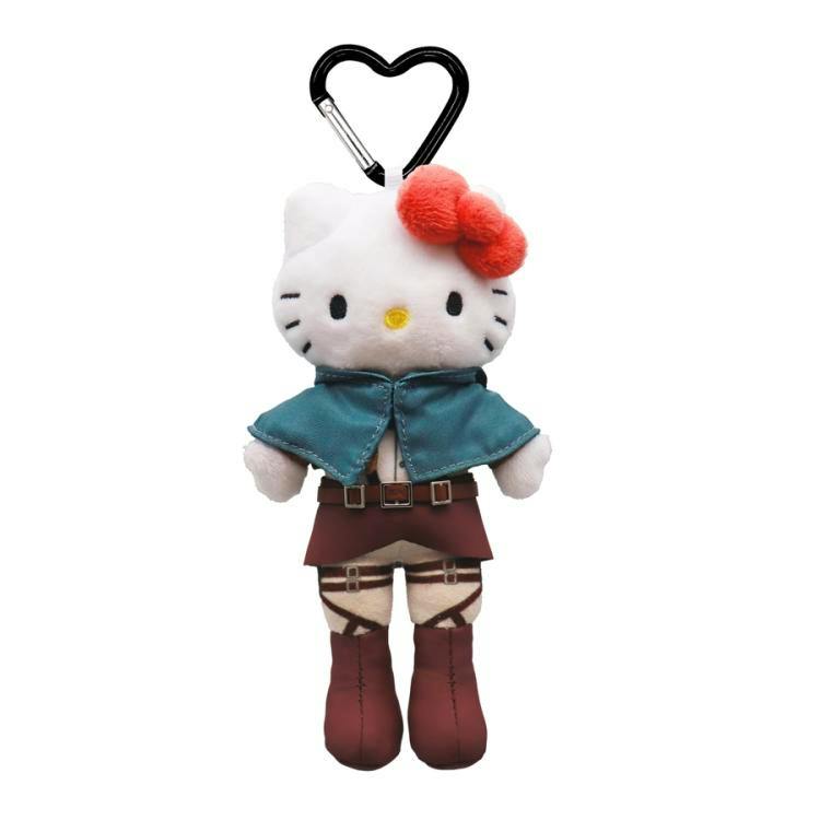 Plush Hello Kitty keychain dressed in an Attack on Titan–style outfit with a teal cape and a black heart-shaped carabiner.