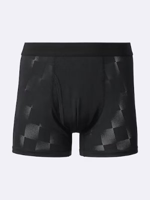Front view of black check-mesh boxer pants on a neutral background.