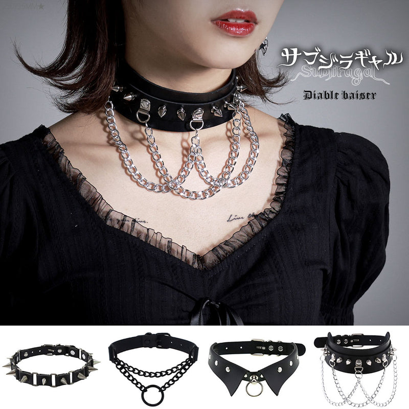 Model wearing a black synthetic leather choker belt with metal chains and studs.