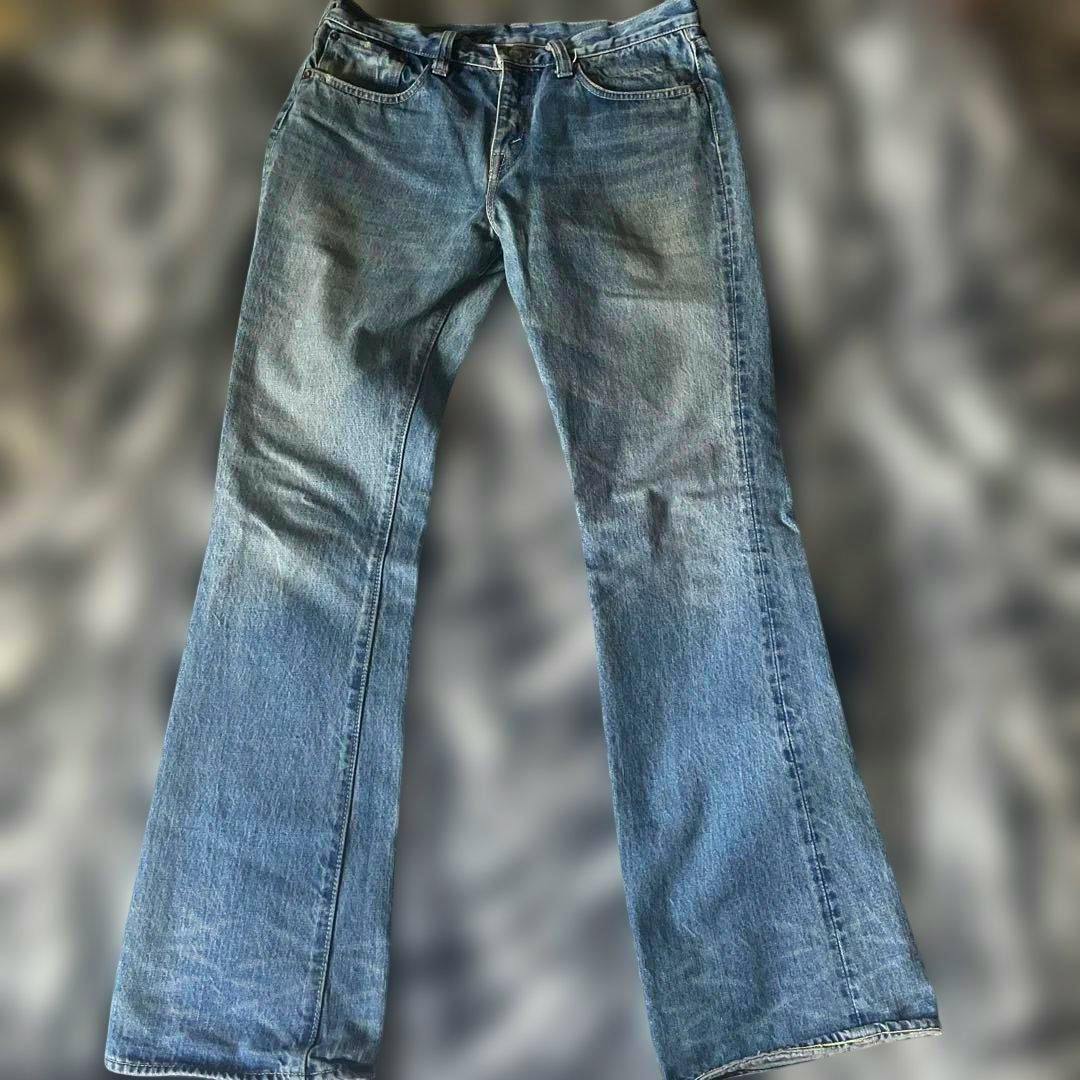 Front view of SUGAR CANE bootcut denim jeans laid flat showing the full length and front details.