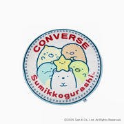 Round cushion showing the Converse logo and Sumikkogurashi characters on a white background.