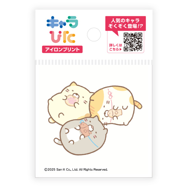 Packaged mini iron-on print sheet showing three Sumikko Gurashi characters on a white backing.