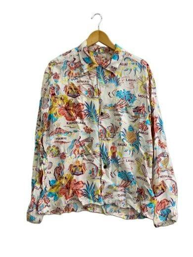 Front view of a white SUN SURF long-sleeve rayon Hawaiian shirt with multicolored tropical print hanging on a hanger.