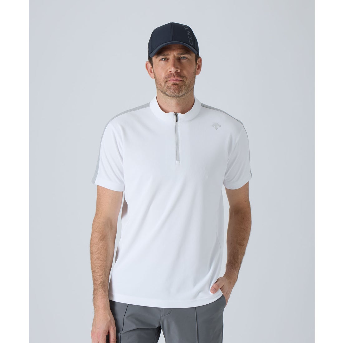 Front view of a man wearing a white SUNSCREEN half-zip mock-neck short-sleeve polyester T-shirt.