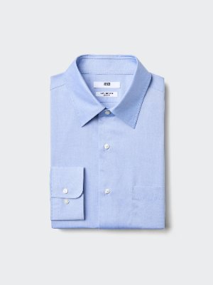 Folded men's button-down slim cotton shirt with stripes in light blue on a neutral background.