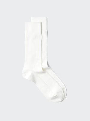 White wide-rib Supima cotton men's socks laid flat on a light background.