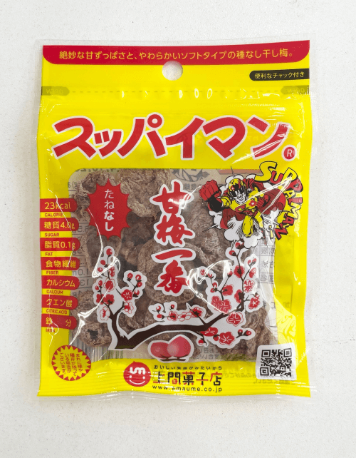 Yellow front pouch of スッパイマン甘梅一番 たねなし dried plums showing the product through a clear window and branding.