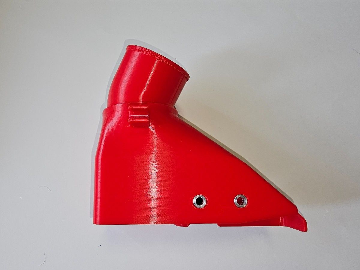 Red ABS air intake piece for a ZC33S Swift Sport shown on a plain white background.