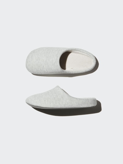Light gray slip-on room slippers shown in top and side views on a white background.