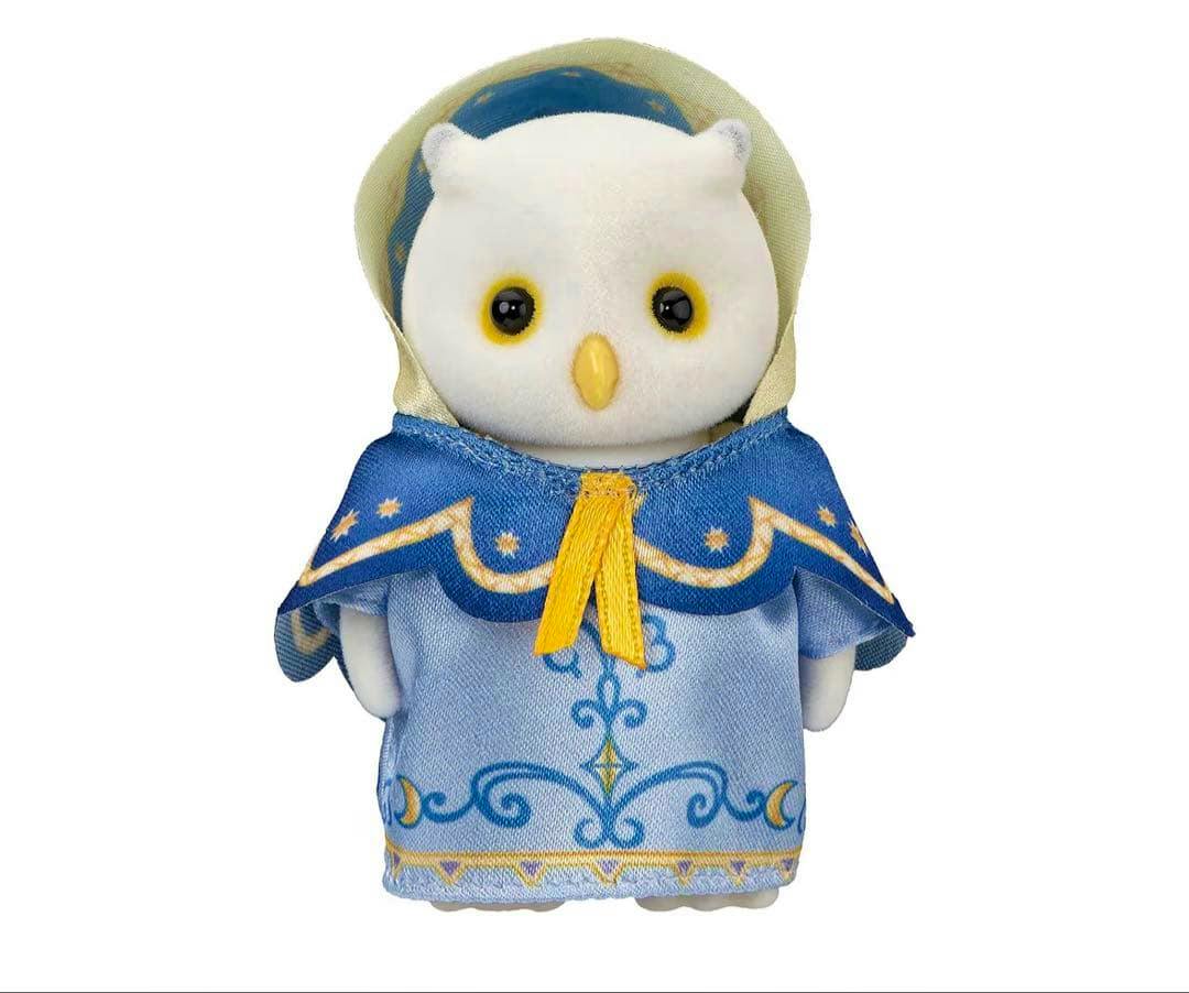 Front-facing Sylvanian Families owl mother doll wearing a blue patterned dress and hood against a white background.
