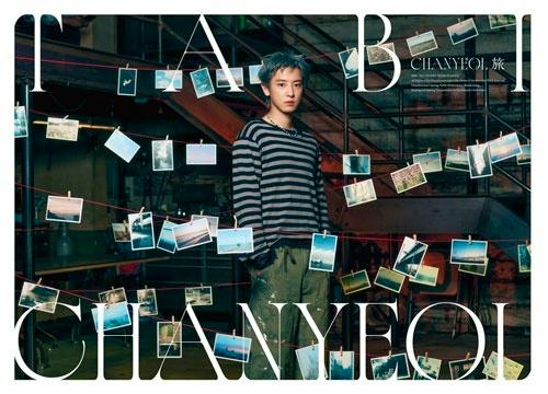 Cover art for the CD showing a person standing among hanging photographs with large overlaid text.