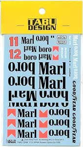 Decal sticker sheet showing multiple printed logos, numbers, and red chevrons under a yellow TABU DESIGN header.