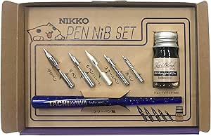 A Tachikawa Nikko manga nib set in its packaging showing multiple nibs, a blue nib holder, and a small ink bottle.
