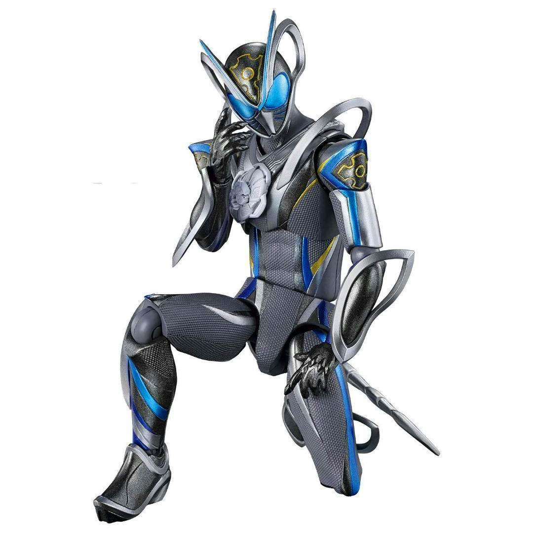 Figure of Kamen Rider Mais in blue and silver armor kneeling against a white background.