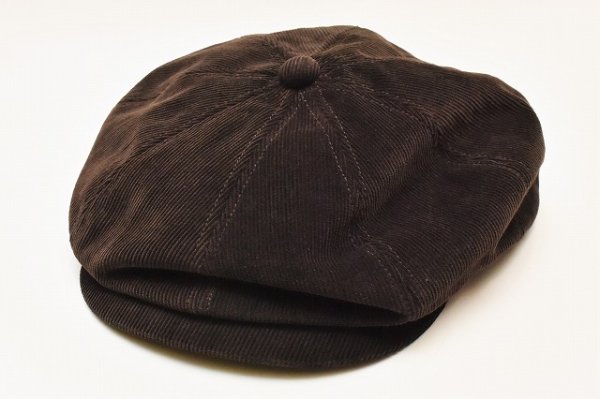 Brown Taiga Takahashi newsboy cap (hat) shown on a white background.