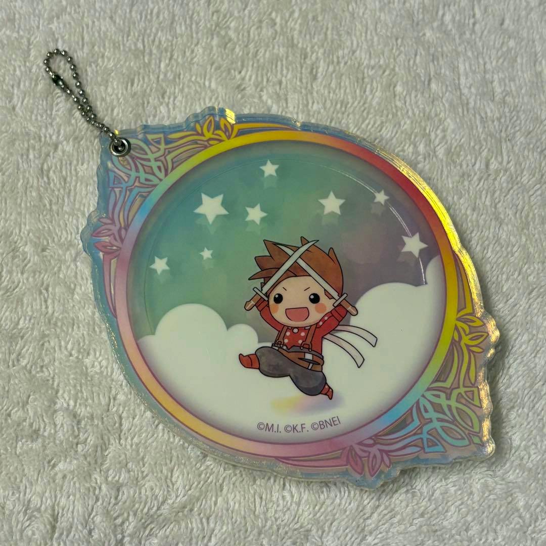 Front side of the Lloyd slide acrylic mirror keychain showing a chibi Lloyd illustration inside a decorative round frame with an attached ball chain.