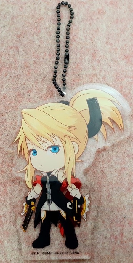 Acrylic chibi-style keychain of Rigret from Tales of the Abyss with attached ball chain on a pink textured background.