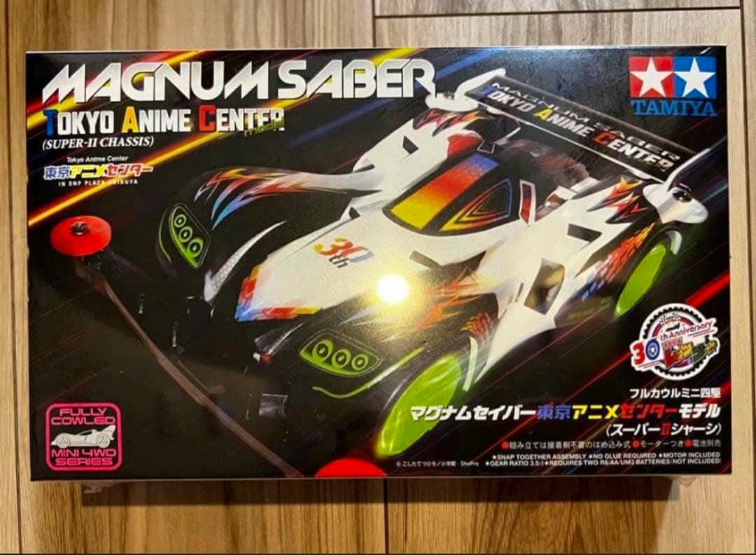 Box of the Tamiya Mini 4WD Magnum Saber Tokyo Anime Center model kit showing the car artwork.