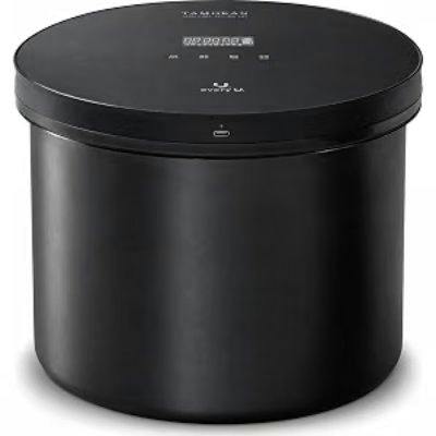 Front view of the Tamokan black storage container (rice cooker) showing a matte cylindrical body and a flat lid with printed icons and a small port.