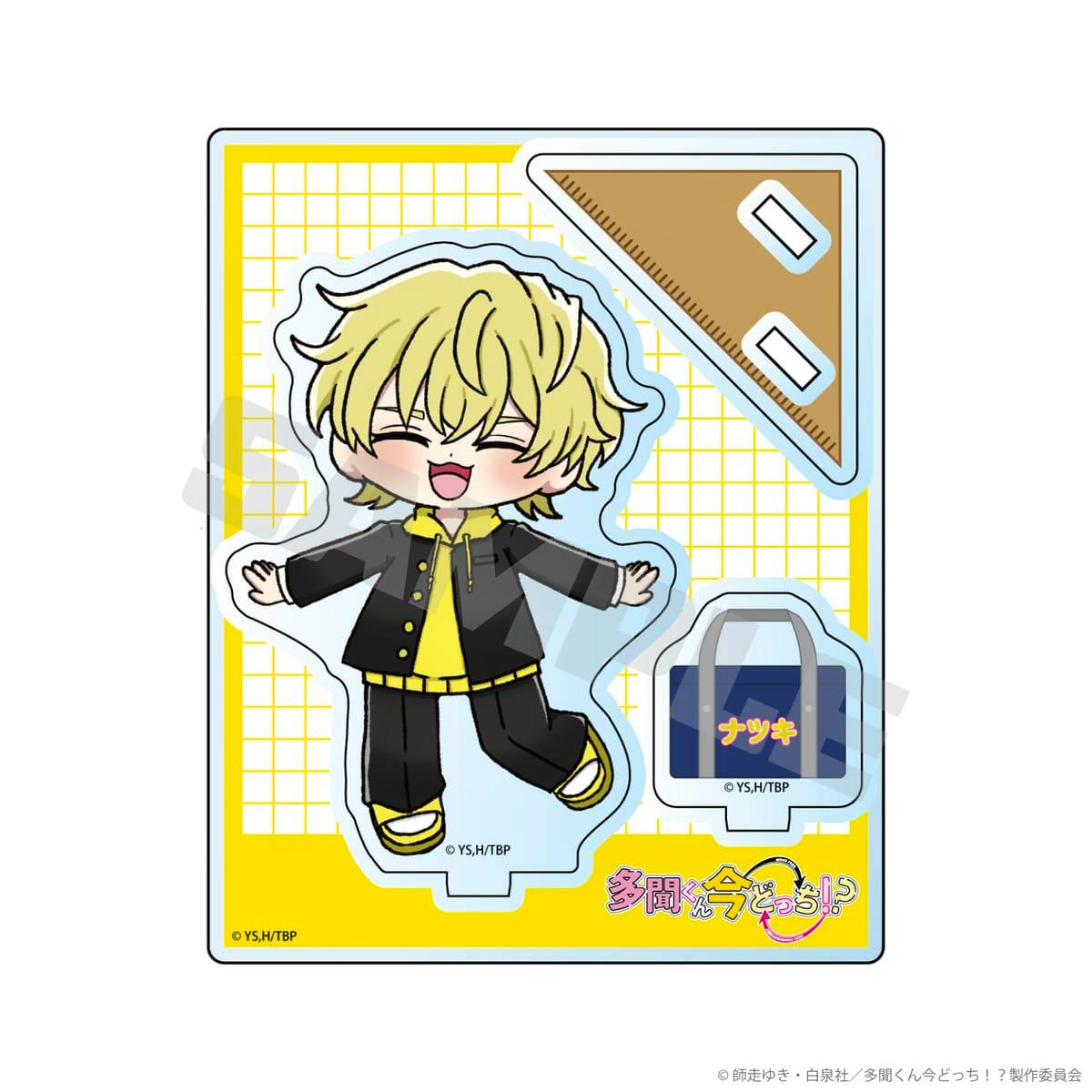 Chibi acrylic stand of Ishibashi Natsuki mounted on a yellow grid backing card with a small bag accessory visible.