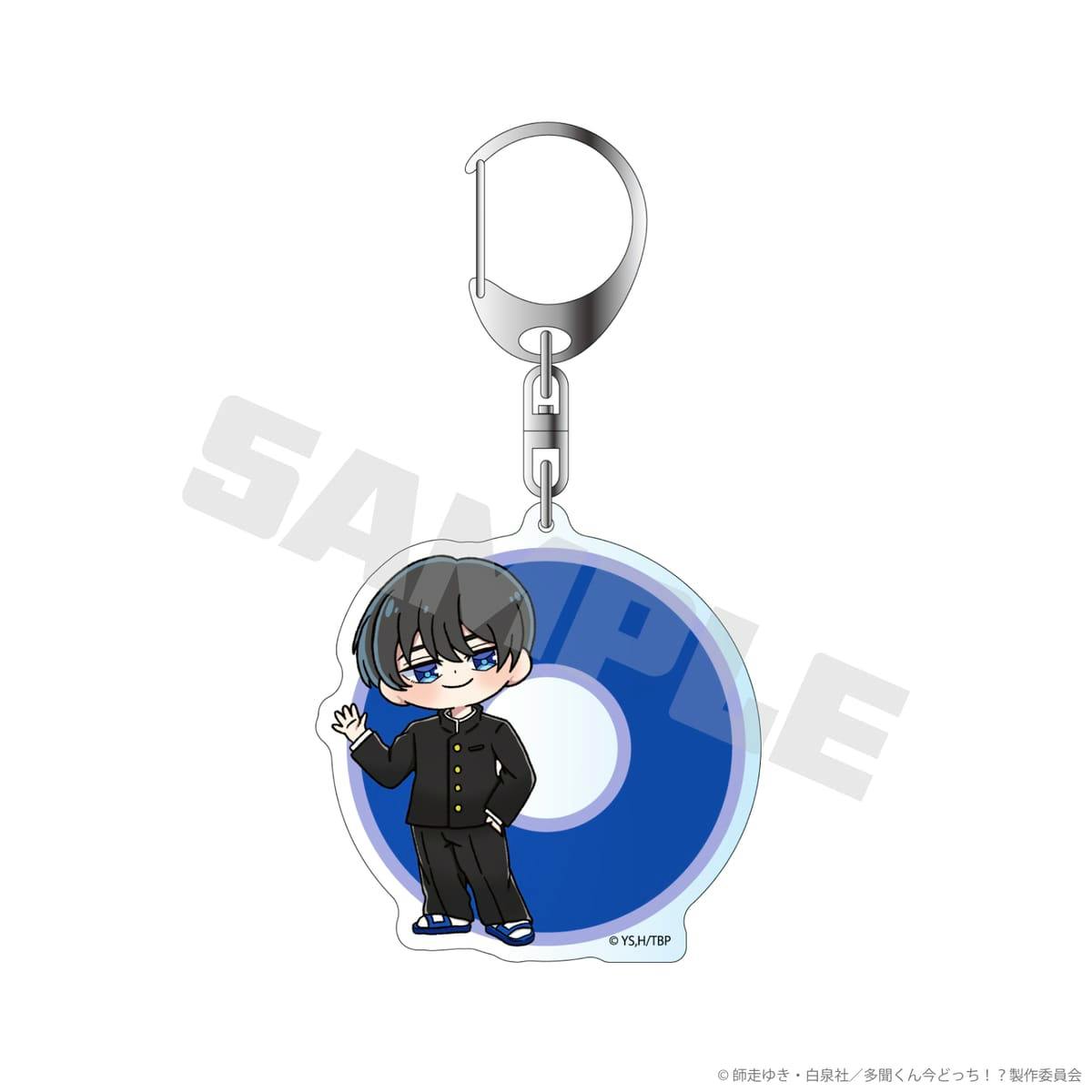 A mockup front view of an acrylic keychain showing a chibi character (坂口桜利) in a black school uniform on a blue circular background with a metal key ring.