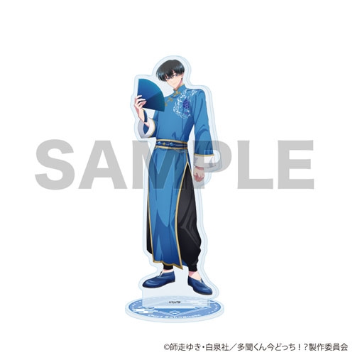 Acrylic stand of 坂口桜利 showing a full-body illustration of him in a blue outfit holding a fan with the round base visible and a SAMPLE watermark.