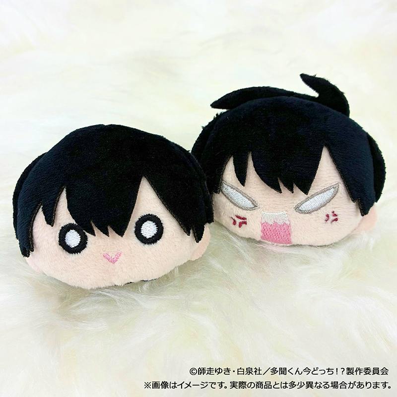 Front view of two F/ACE plush hair clip charms of Sakaguchi Sakuri showing two facial expressions on a white fuzzy background.