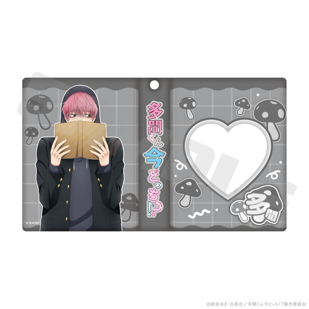 Mockup of the MINIフォトアルバム cover showing an illustrated pink-haired character holding a book, a heart-shaped photo window, and mushroom graphics.