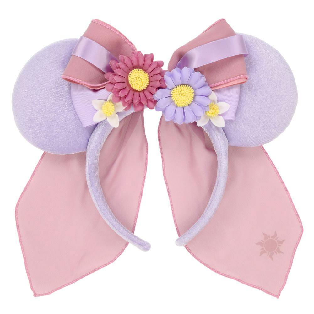 Lavender-and-pink Rapunzel-themed headband with round ears, a central bow with two fabric flowers, and long pink ribbon tails.