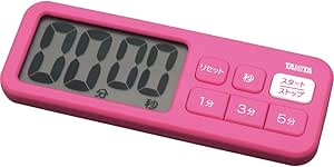Pink Tanita Plus Timer TD-395 PK digital kitchen timer with a large LCD screen and control buttons.