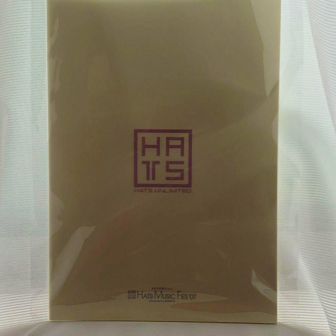 Front cover of the concert pamphlet showing a centered HATS logo and small text near the bottom.