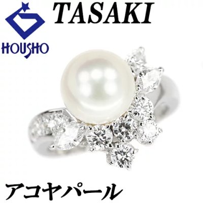 Platinum Tasaki ring featuring a central Akoya pearl surrounded by diamonds.