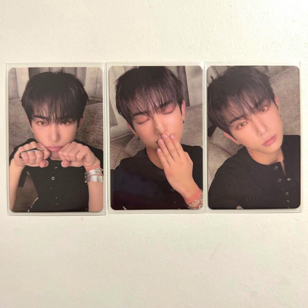 Three HARUA photocard portraits in clear sleeves arranged side-by-side on a white background.
