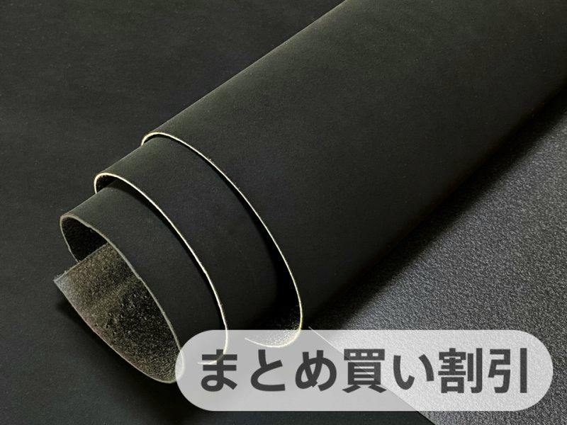 Rolled black nubuck-style artificial leather fabric (polyester) on a dark background with a Japanese discount banner overlay.