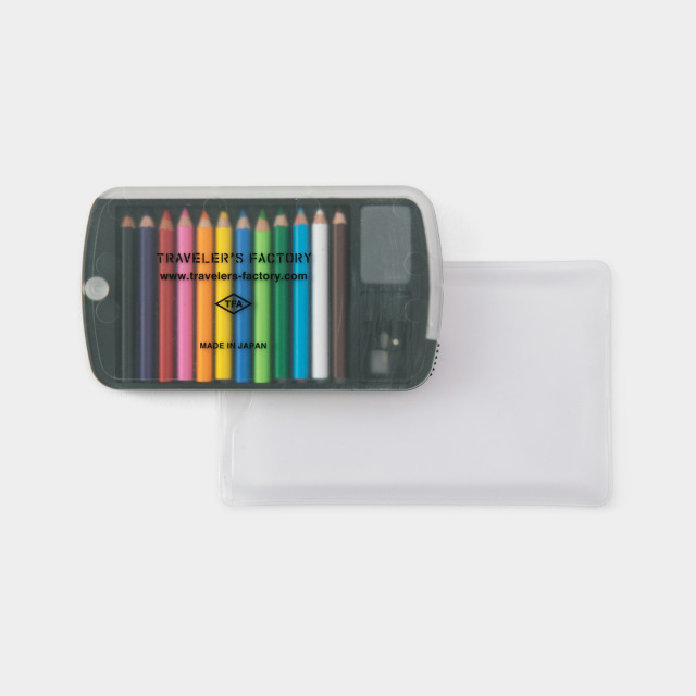 Clear plastic case holding a set of mini colored pencils in various colors and a small sharpener.