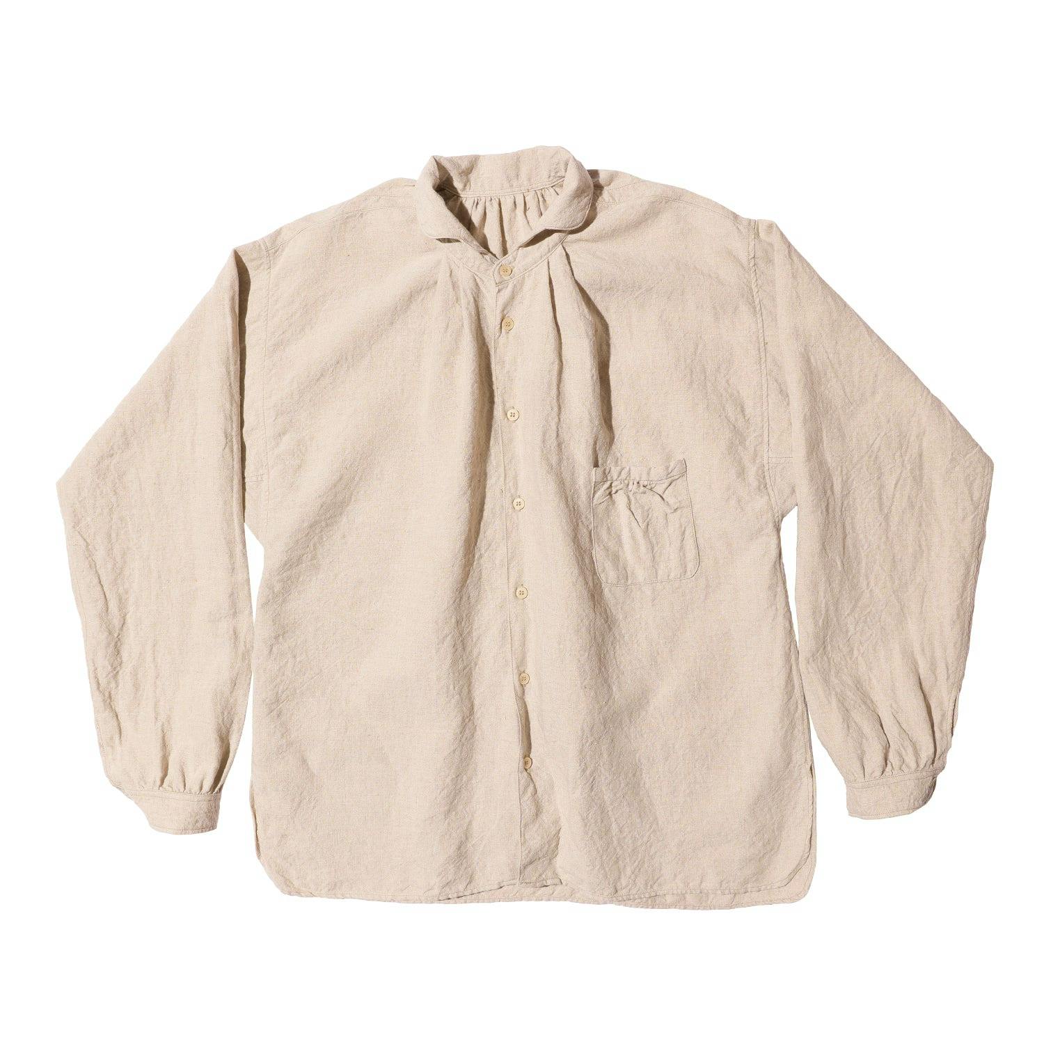 Beige The 2 Monkeys Linen Cambrai men's shirt laid flat showing the front, button placket, chest pocket, collar, and long sleeves.