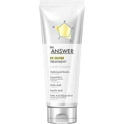Tube of THE ANSWER EX Gloss Treatment conditioner showing the product label and yellow pentagon graphic.