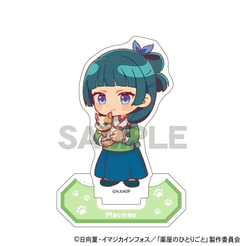 Acrylic stand showing a chibi character holding a cat, mounted on a green paw‑print base with a SAMPLE watermark.