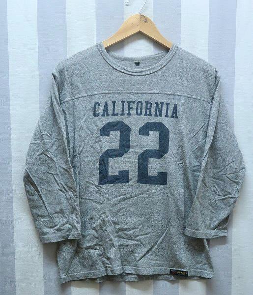 Gray cotton sweatshirt with "CALIFORNIA 22" printed on the front hanging on a wooden hanger.