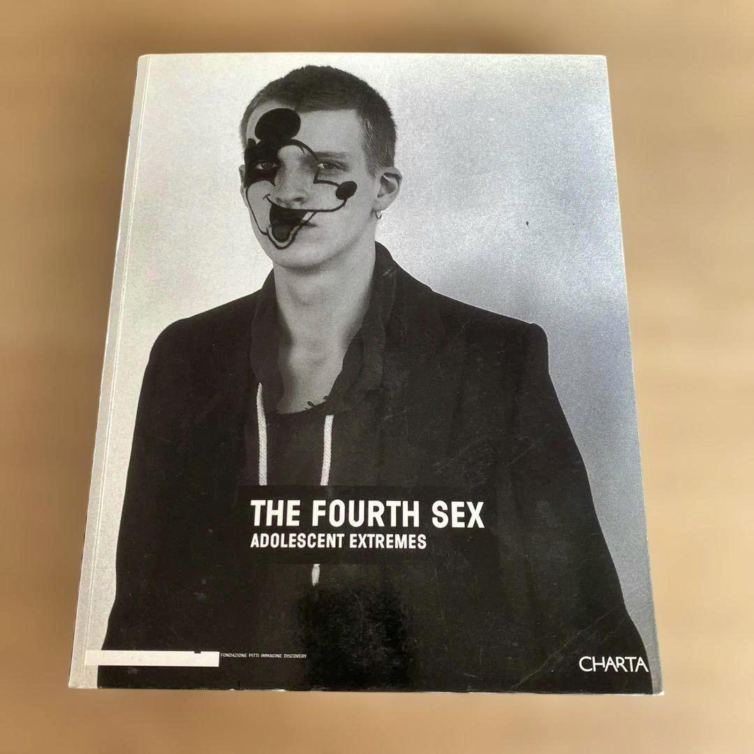 Front cover of the book showing the title "THE FOURTH SEX ADOLESCENT EXTREMES" and a black-and-white photo of a young man with face paint.