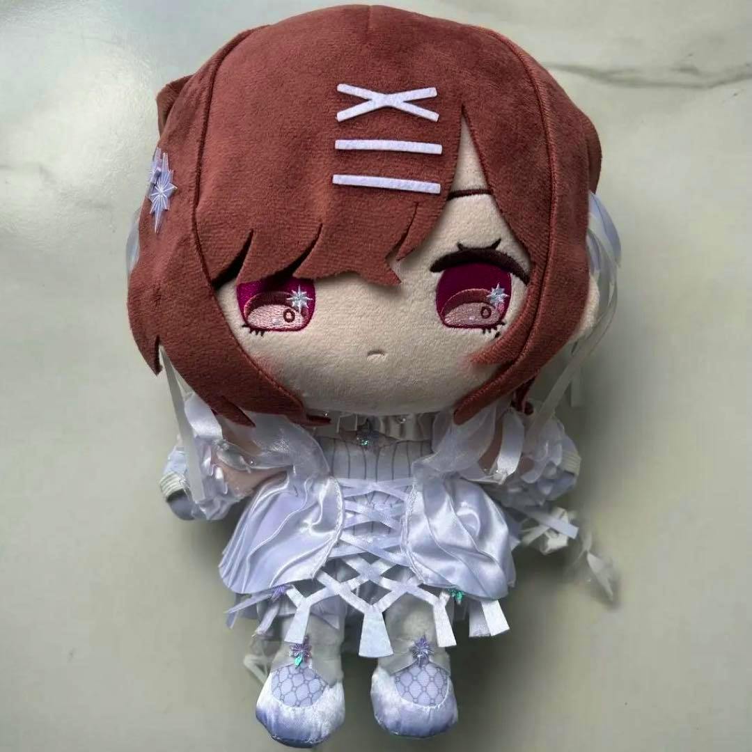Front view of the 樋口円香 plush toy wearing a white frilly outfit, with brown hair and embroidered pink eyes.