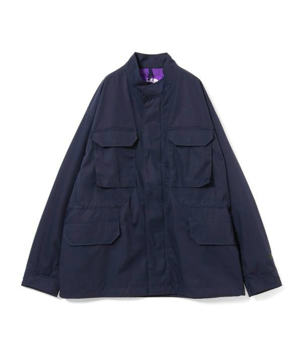 Front view of a navy men's 65/35 Field Jacket with four flap pockets and a visible purple label.