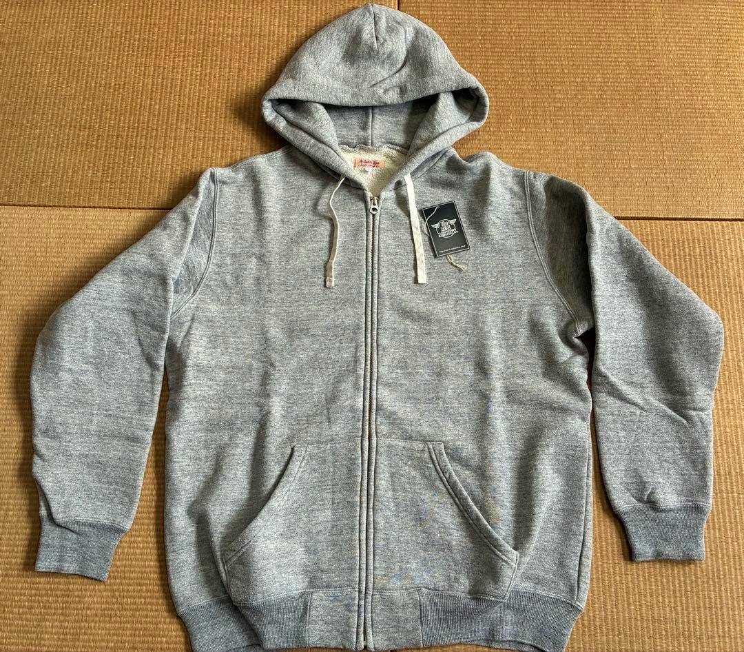 Gray full-zip men's cotton hoodie laid flat showing hood, front zipper, kangaroo pockets, and drawstrings.