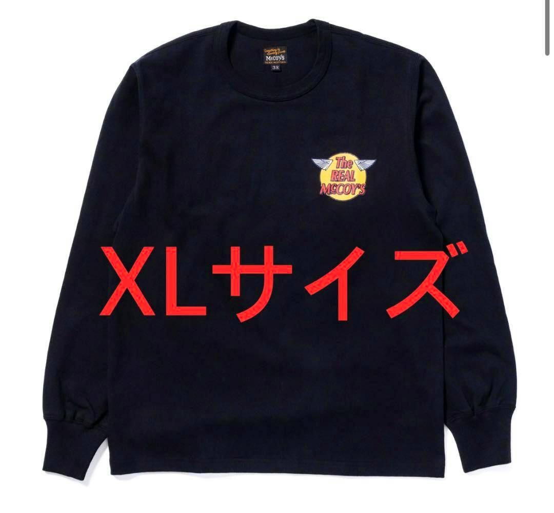 Black long-sleeve cotton sweater laid flat showing a small 'The REAL McCOY'S' chest logo with large red "XLサイズ" text overlaid.