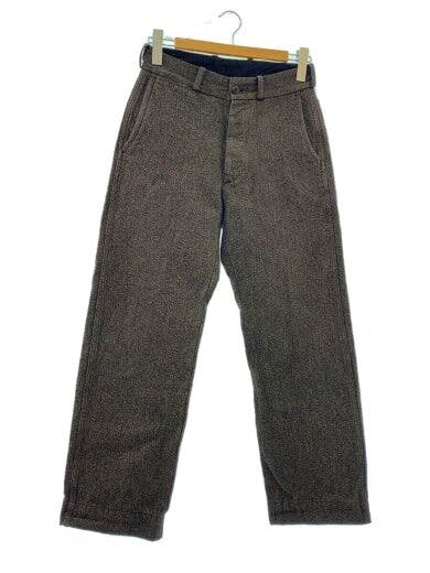 Front view of REAL McCoyS brown textured pants hanging on a wooden hanger against a white background.