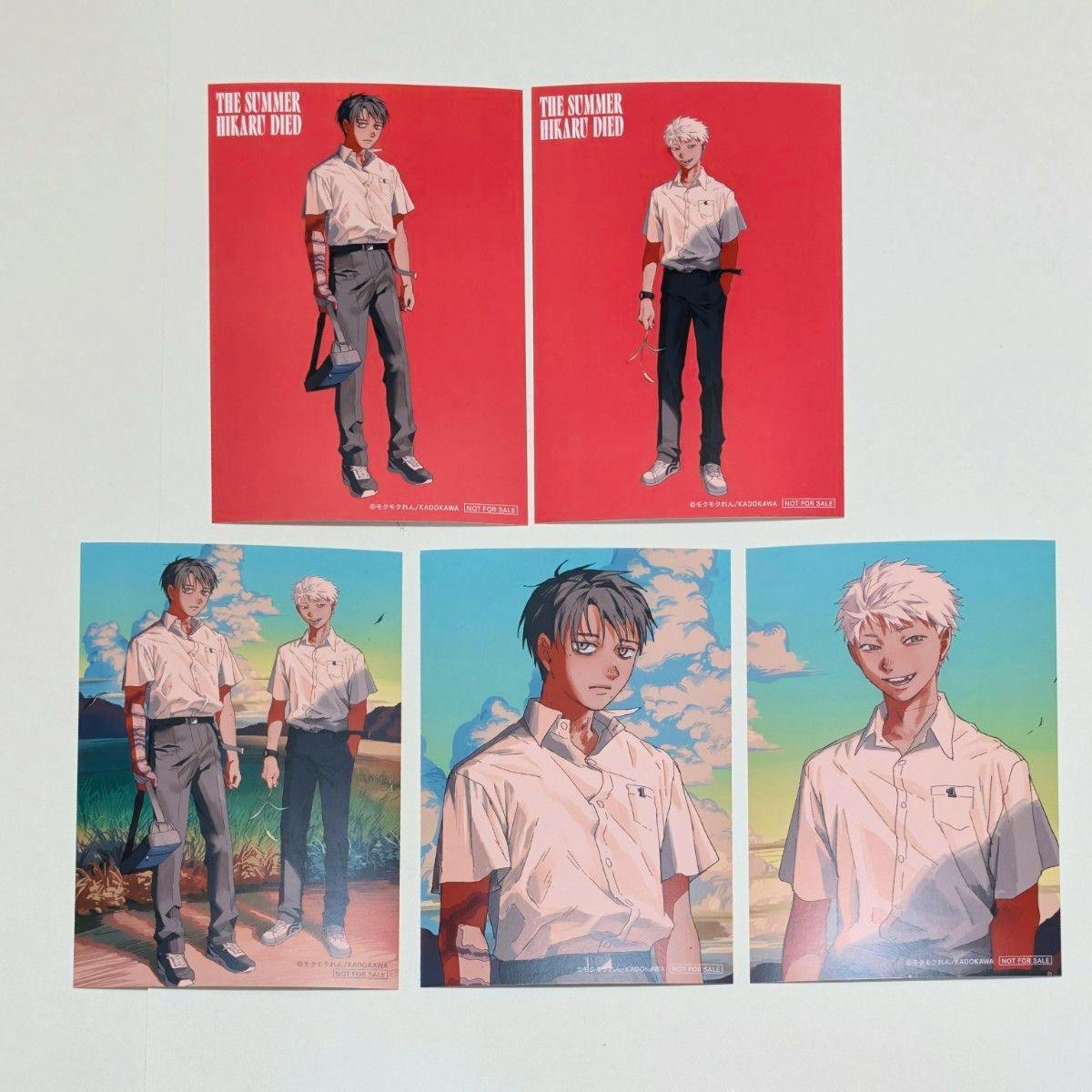 Five illustrated postcards from the '光が死んだ夏' postcard set arranged on a white background, with two red full-body designs on top and three colored portrait scenes below.