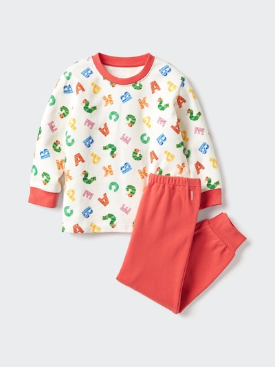 Children's cotton pajama set with a printed Very Hungry Caterpillar pattern on a long-sleeve top and solid-colored pants on a neutral background.
