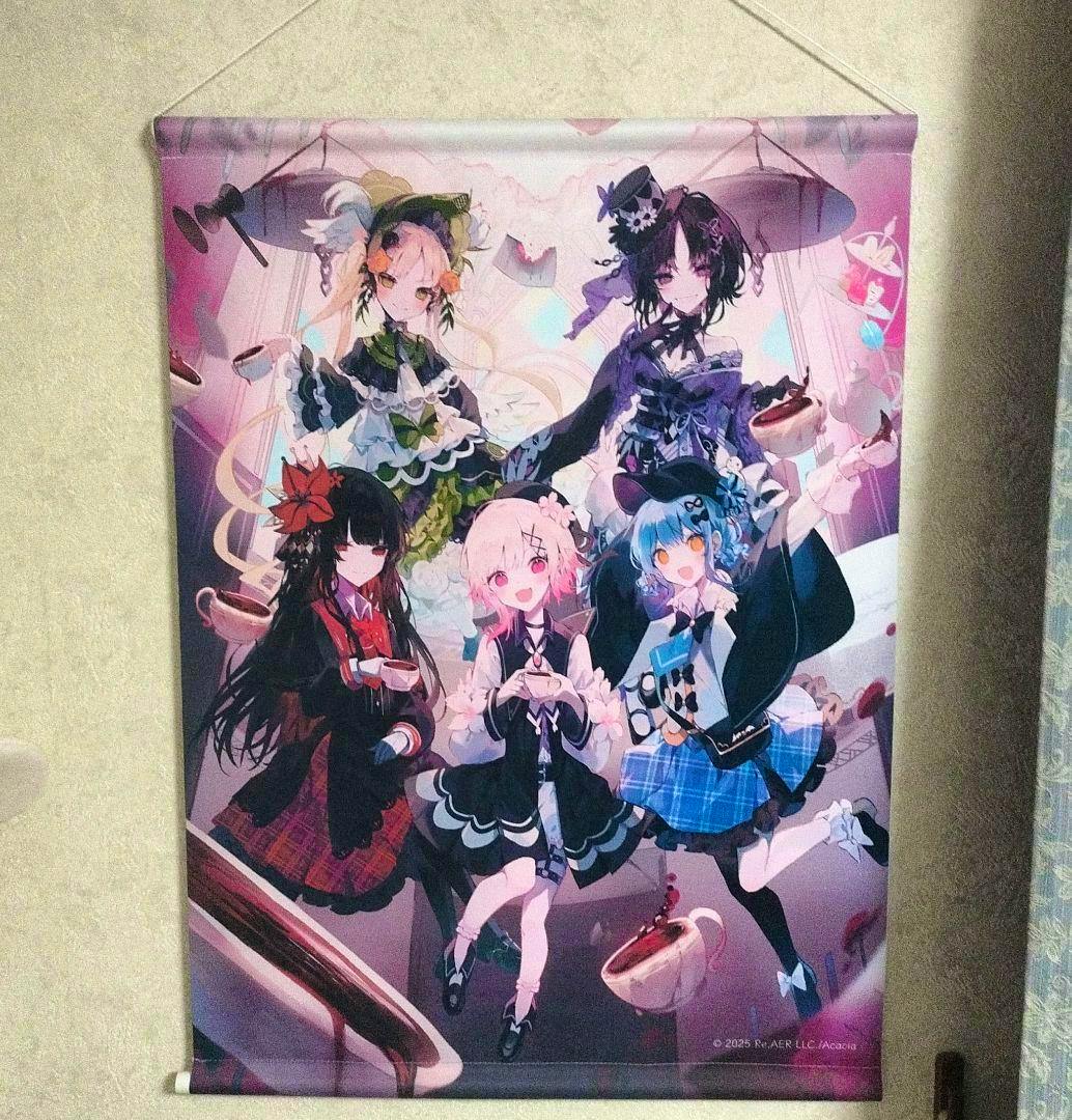Front of the B2 tapestry showing illustrated magical-girl characters in colorful outfits hung on a wall.