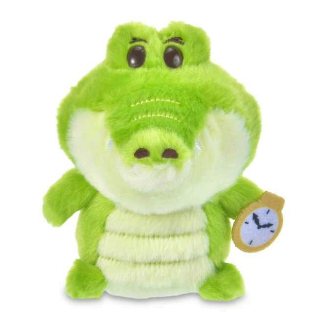 Front-facing green crocodile plush toy holding a small clock prop on a white background.